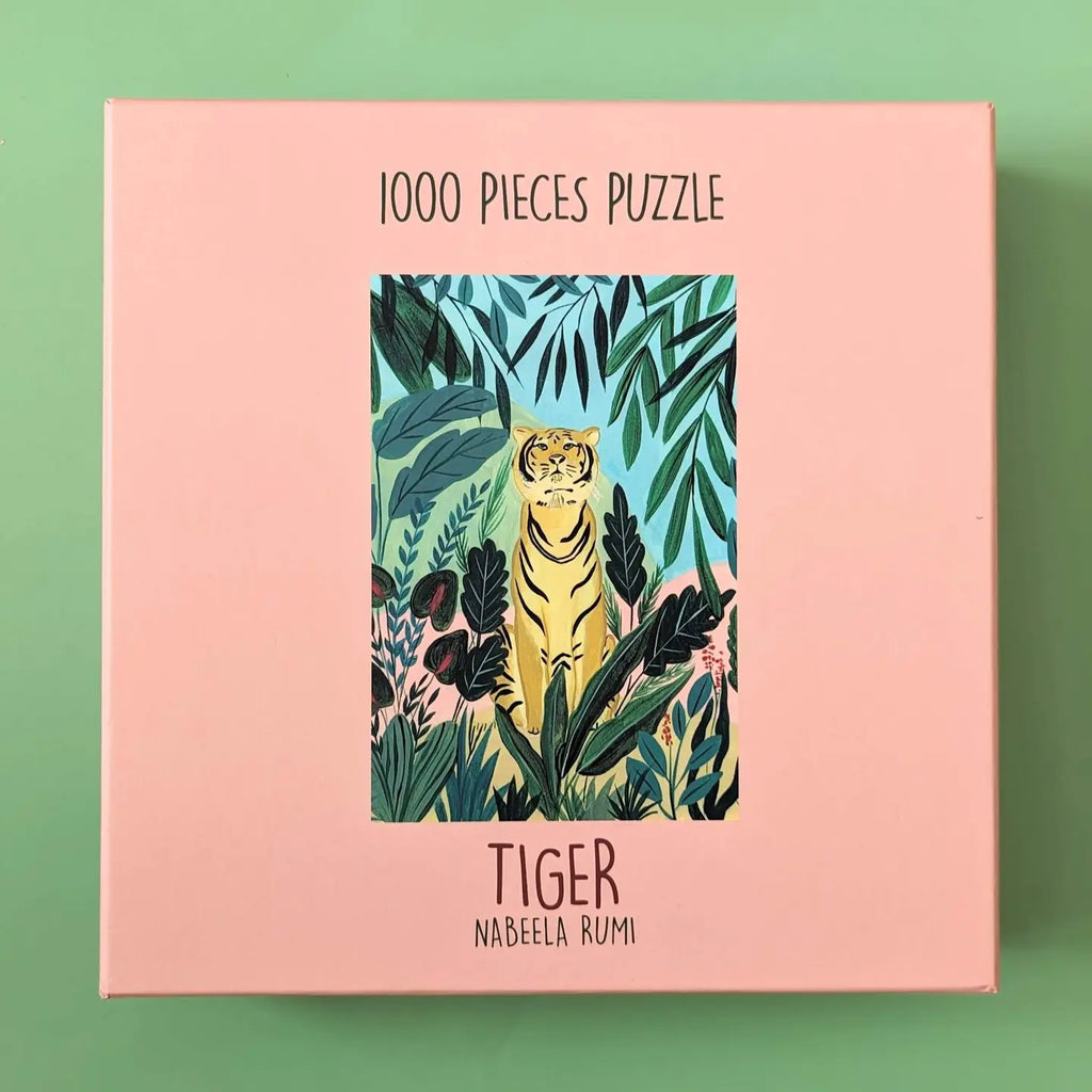 Puzzle box with a tiger illustration on a pink background