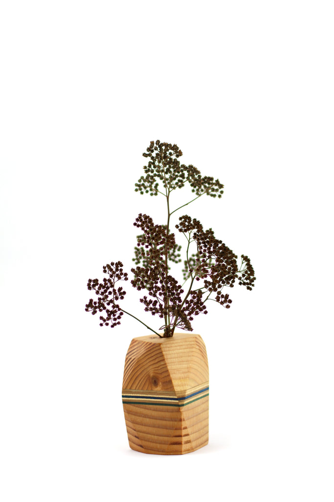 Wood block vase with dried flowers